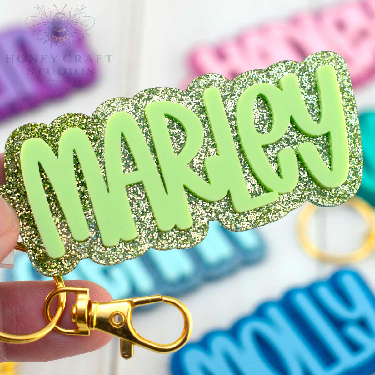 Bright lime green glitter keychain with personalized name, fun and durable backpack tag for kids.