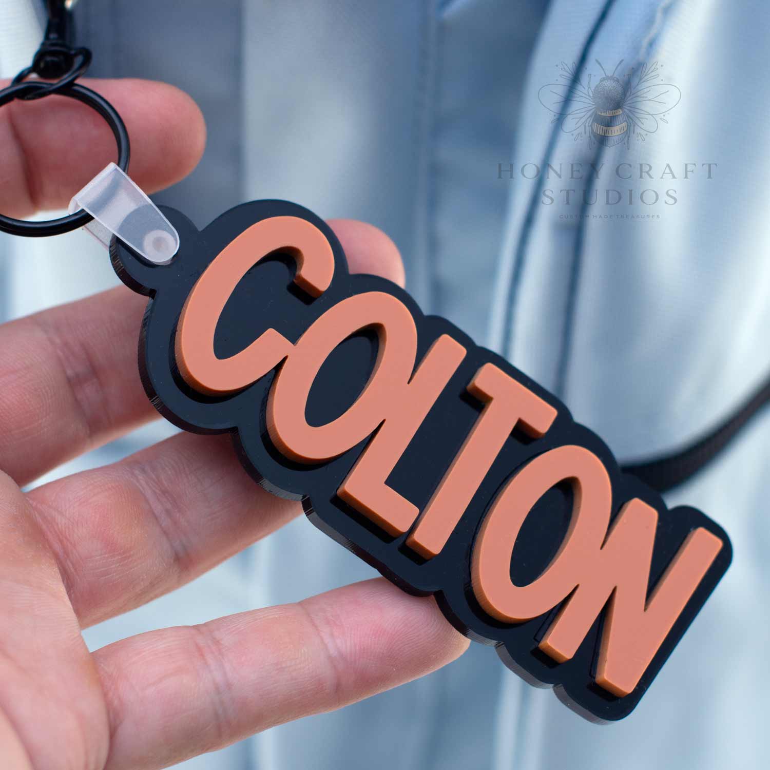 Acrylic name tag keychain in Terracotta orange, great for labeling lunchboxes, gym bags, or birthday gifts.