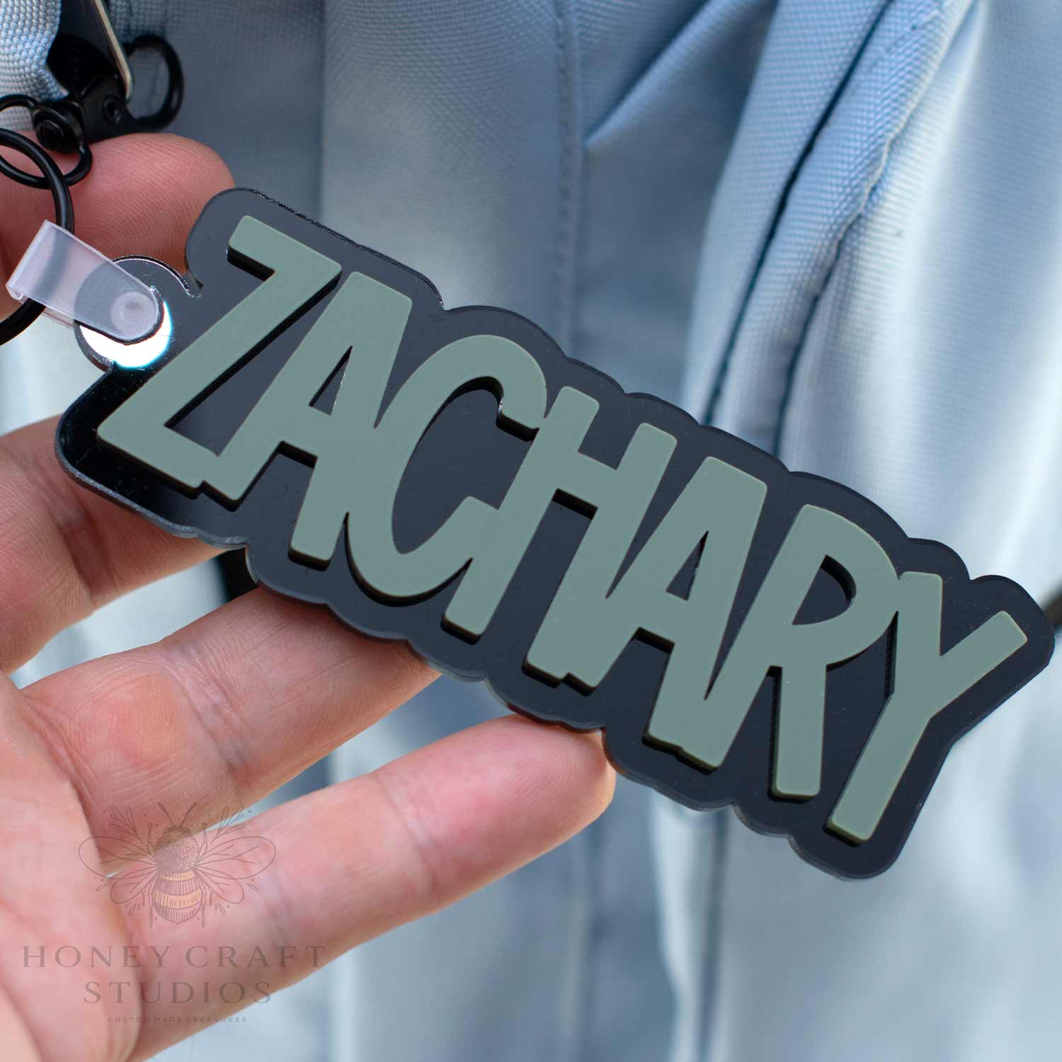 Fern Green custom name keychain made of layered acrylic, ideal for kids, teens, and back-to-school essentials.