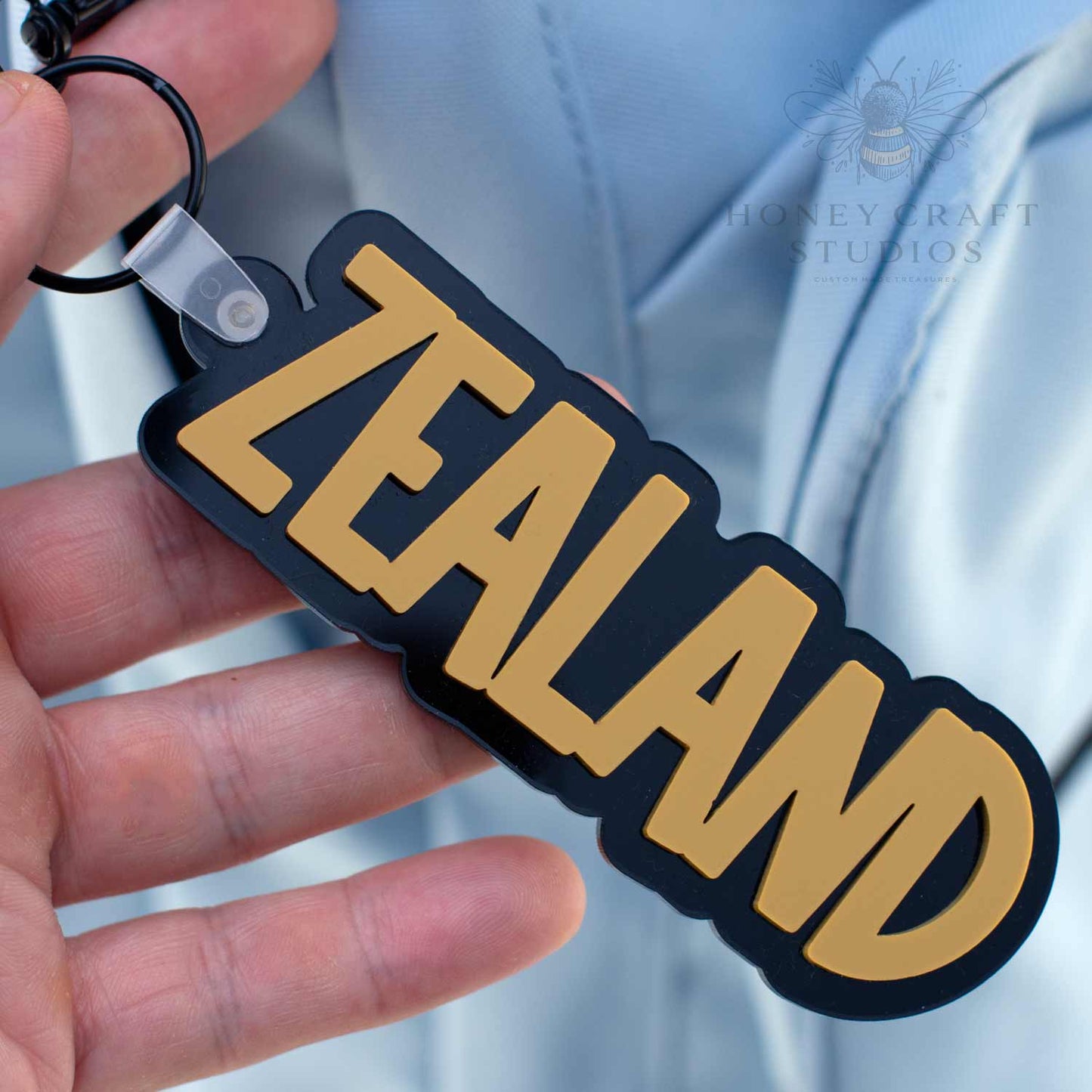 Custom name keychain in Mustard yellow acrylic, perfect for back-to-school or kids’ sports bag tags.