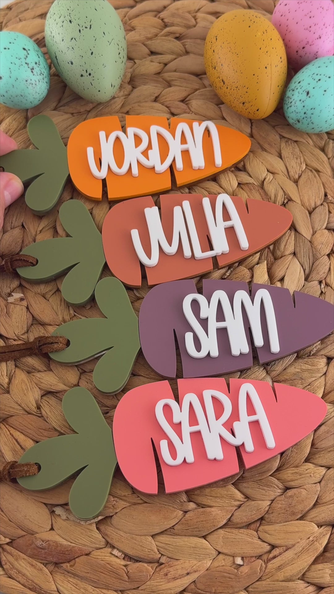 Custom acrylic carrot Easter basket tags with raised white names in assorted colors made by Honey Craft Studios